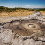 Muddy volcanoes & Unirea salt mine tour